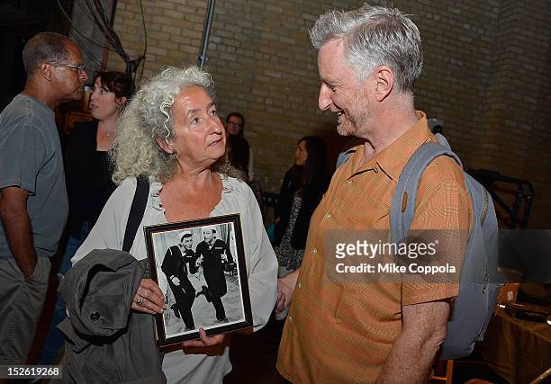 Nora Guthrie and Billy Bragg speak backstage during the 'This Land Is Your Land' Woody Guthrie At 100 Concert as part of the Woody Guthrie Centennial...