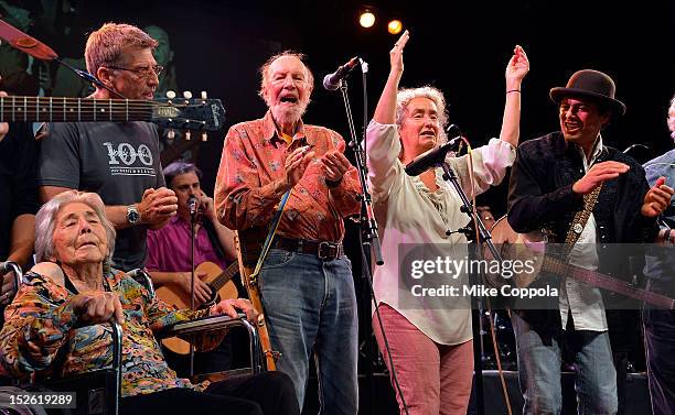 Toshi Seeger, Bob Santelli, Pete Seeger, and Nora Guthrie on stage during the 'This Land Is Your Land' Woody Guthrie At 100 Concert as part of the...