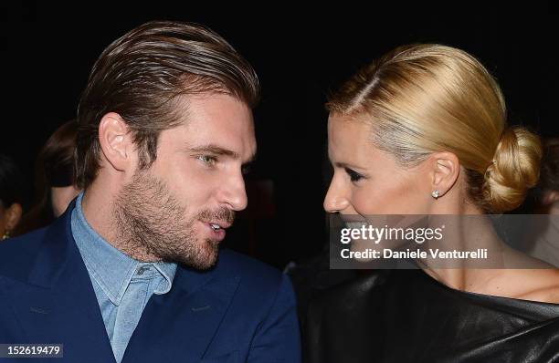 Tomaso Trussardi and Michelle Hunziker attend the Trussardi Spring/Summer 2013 fashion show as part of Milan Womenswear Fashion Week on September 23,...