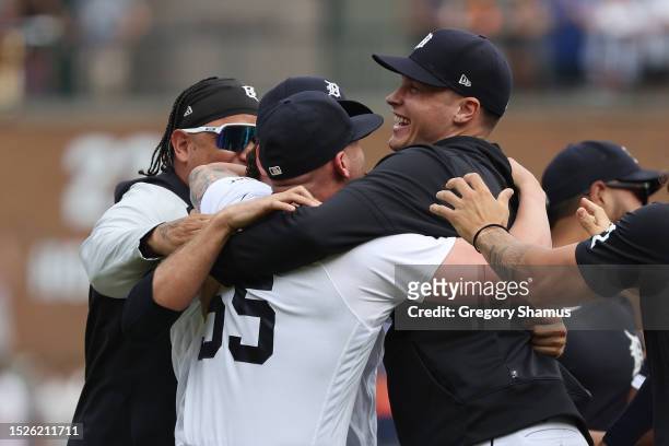 Alex Lange, Matt Manning and Jason Foley celebrate their combined no hitter against the Toronto Blue Jays along with Miguel Cabrera at Comerica Park...