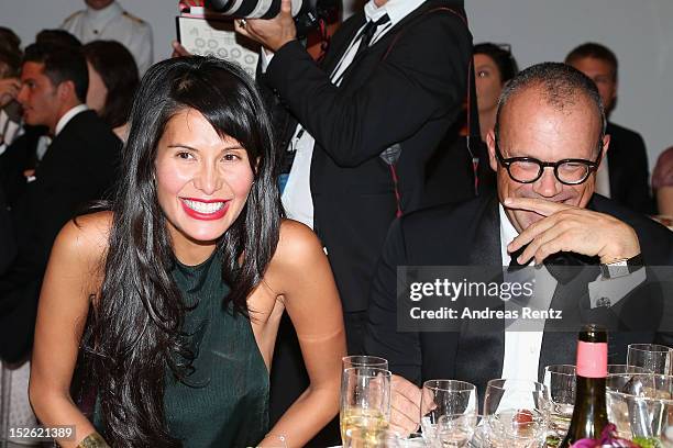 Goga Ashkenazi and Cesare Cunaccia attend the amfAR Milano 2012 Dinner during Milan Fashion Week at La Permanente on September 22, 2012 in Milan,...