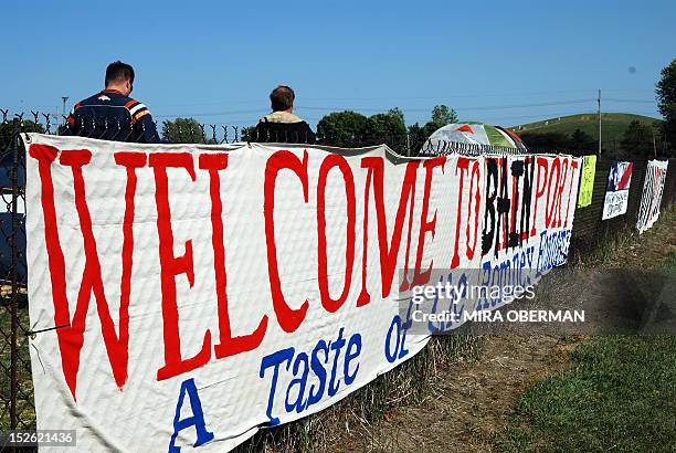 By Mira Oberman, US-vote-Republicans-Romney-cuts-economy-Bain A banner declaring "Welcome to Bainport -- A Taste of the Romney economy" adorns a...