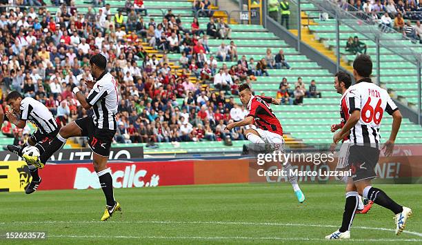 Stephan El Shaarawy of AC Milan scores their first goal during the Serie A match between Udinese Calcio and AC Milan at Stadio Friuli on September...