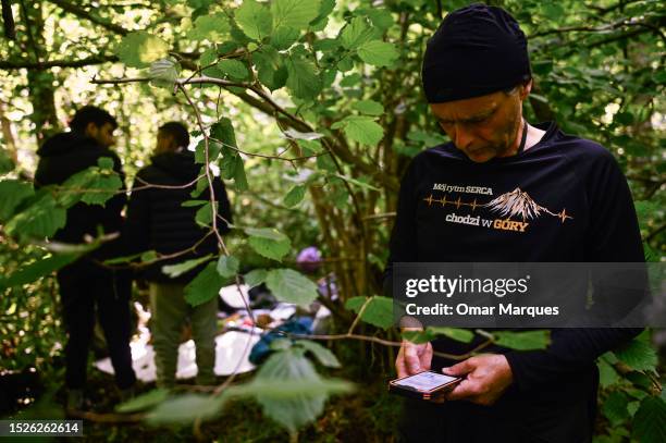Bartek, a worker of Ocalenie Foundation send GPS coordinates to Polish border guard to pick migrants from Morocco who lived in the forest for 23 days...
