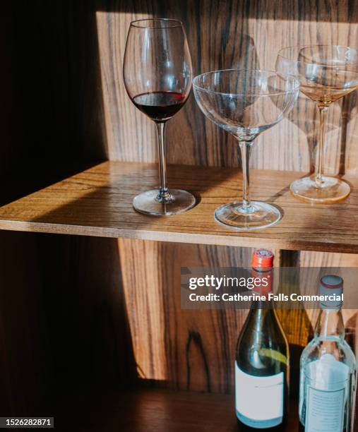 a sparse drinks cabinet - cabinet stock pictures, royalty-free photos & images