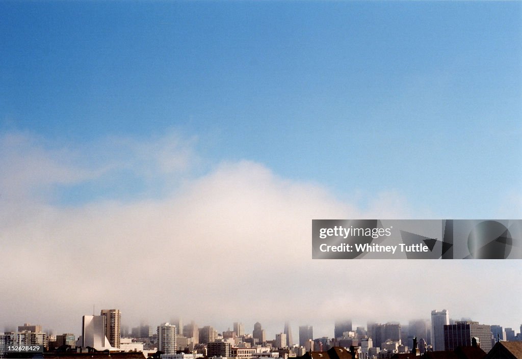San Francisco skyline covered in fog