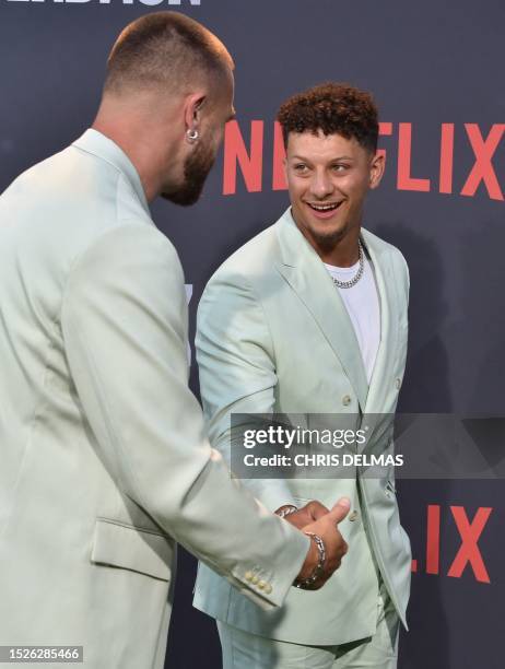 Kansas City Chief's american football players Patrick Mahomes and Travis Kielce arrive for the premiere of Netflix's docuseries "Quarterback" at the...