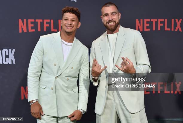 Kansas City Chief's american football players Patrick Mahomes and Travis Kielce arrive for the premiere of Netflix's docuseries "Quarterback" at the...