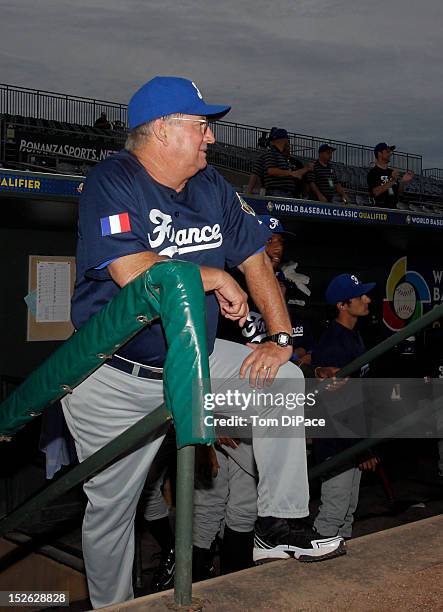 Jim Stoeckel manager of Team France looks on from the dugout before game 2 of the Qualifying Round of the 2013 World Baseball Classic at Roger Dean...