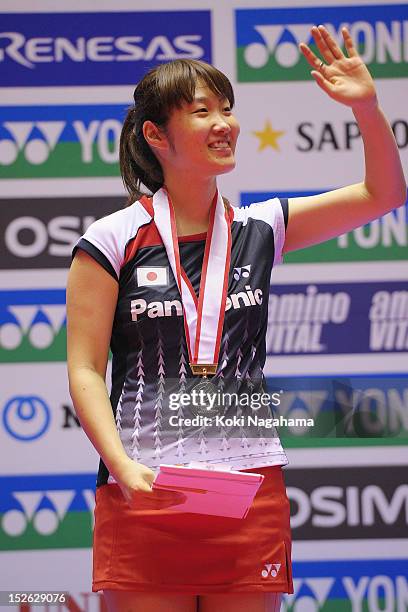 Eriko Hirose of Japan poses on the podium after losing the women's singles final match against Tzu Ying Tai of Taiwan during day five of the Yonex...