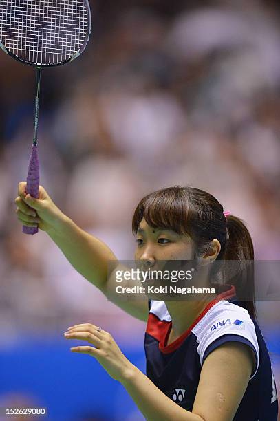 Eriko Hirose of Japan competes in the women's singles final match against Tzu Ying Tai of Taiwan during day five of the Yonex Open Japan 2012 at...