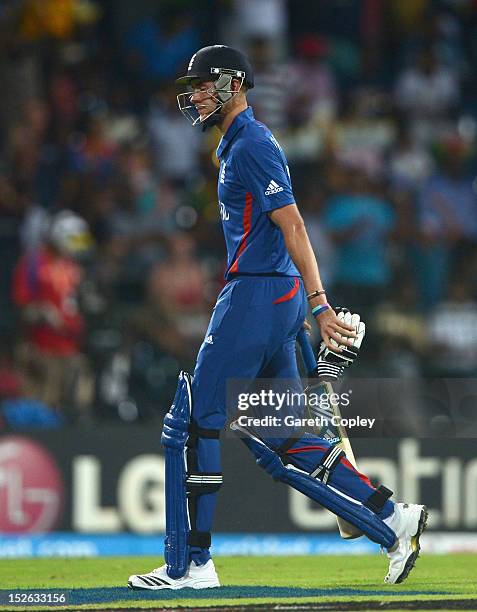 England captain Stuart Broad leaves the field after being dismissed by Ashok Dinda of India during the ICC World Twenty20 2012 Group A match between...