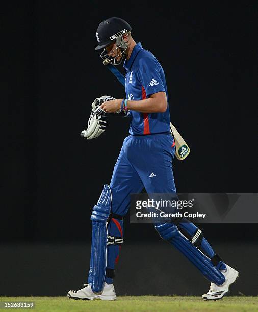 England captain Stuart Broad leaves the field after being dismissed by Ashok Dinda of India during the ICC World Twenty20 2012 Group A match between...