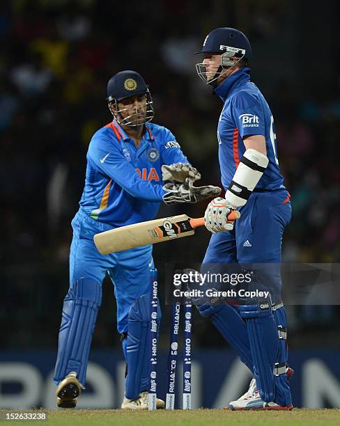 Graeme Swann of England leaves the field after being stumped by India captain MS Dhoni of India during the ICC World Twenty20 2012 Group A match...