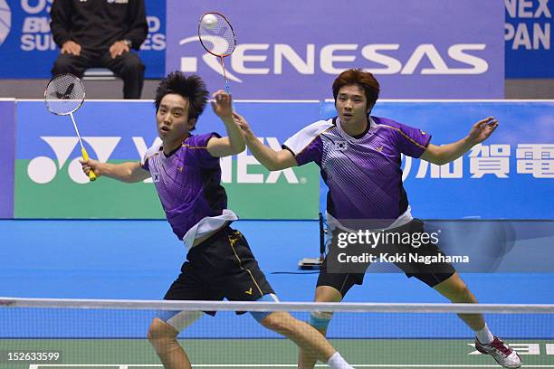 Sa Rang Kim and Ki Jung Kim of South Korea compete in the men's doubles final match against Kien Keat Koo and Boon Heong Tan of Malaysia during day...