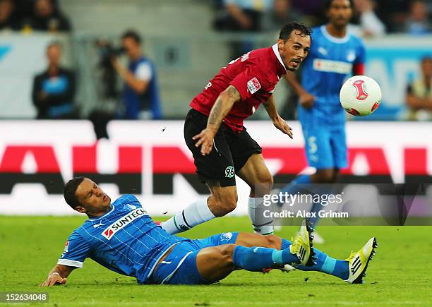 Sergio da Silva Pinto of Hannover is challenged by Sejad Salihovic of Hoffenheim during the Bundesliga match between 1899 Hoffenheim and Hannover 96...