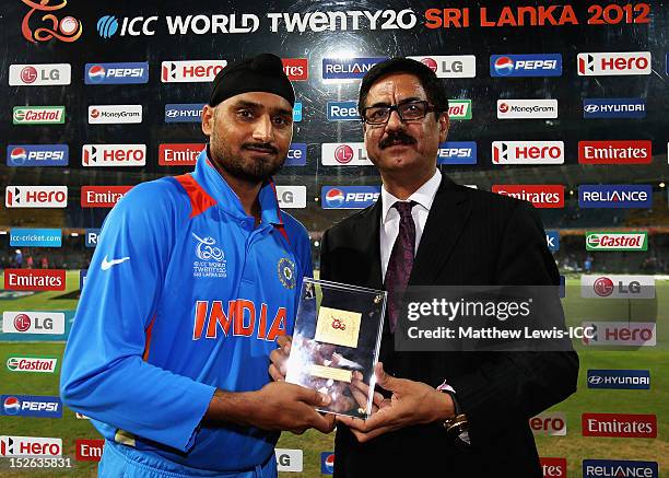 Harbhajan Singh of India is presented with the 'Man of the Match' award after the ICC World Twenty20 2012 Group A match between England and India at...