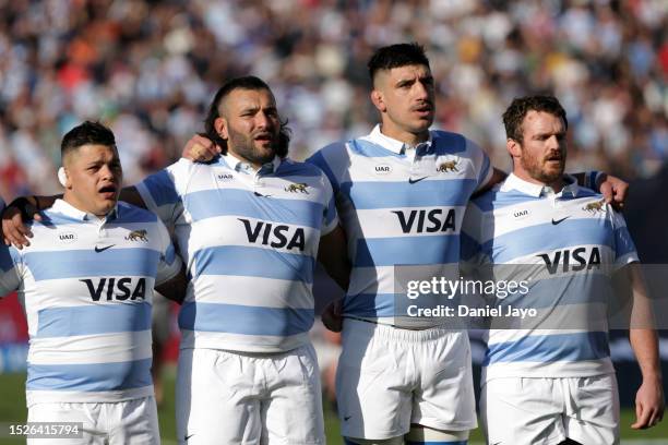 Thomas Gallo, Lucio Sordoni, Matias Alemanno and Julian Montoya of Argentina sign the national anthem prior to a Rugby Championship match between...