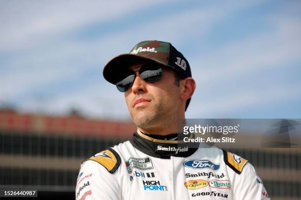 Aric Almirola, driver of the Smithfield/IHOP Ford, looks on during qualifying for the NASCAR Cup Series Quaker State 400 Available at Walmart at...