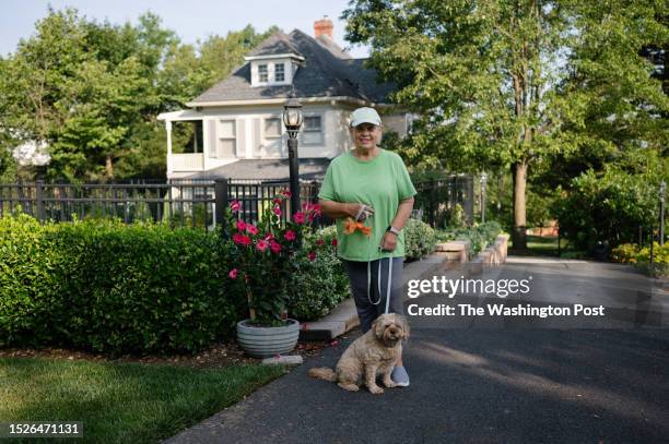 Joann Rockwell stands in front of her home in Mount Airy, Maryland on July 8, 2023. Rockwell has lived in the town for 44 years. .