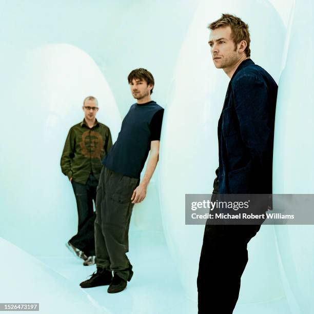 Rock band Blur Dave Rowntree, Alex James and Damon Alburn are photographed in 2003 in London, England.