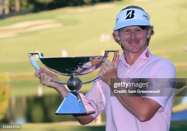 Brandt Snedeker poses with the FedExCup after after his three stroke victory at the TOUR Championship clinched the cup during the final round of the...