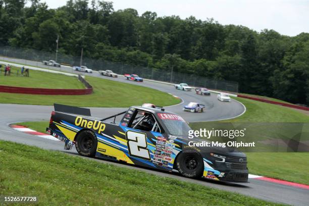Nick Sanchez, driver of the Gainbridge Chevrolet, drives during the NASCAR Craftsman Truck Series O'Reilly Auto Parts 150 at Mid-Ohio Sports Car...