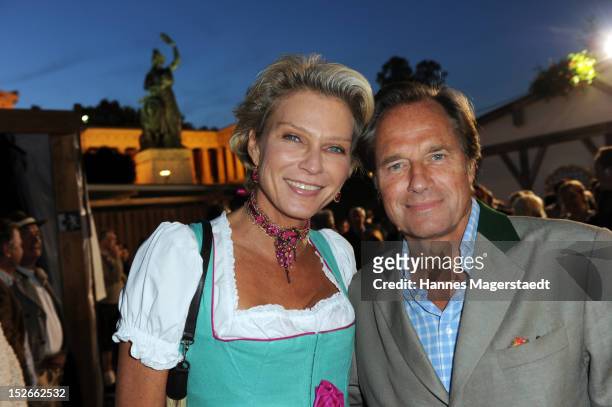 Stephanie von Pfuel and Hendrik teNeuss attend the Oktoberfest beer festival at Kaefer on September 23, 2012 in Munich, Germany.