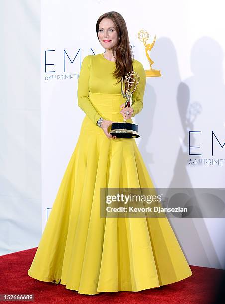 Actress Julianne Moore, winner Outstanding Lead Actress in a Miniseries or a Movie for "Game Change," poses in the press room during the 64th Annual...