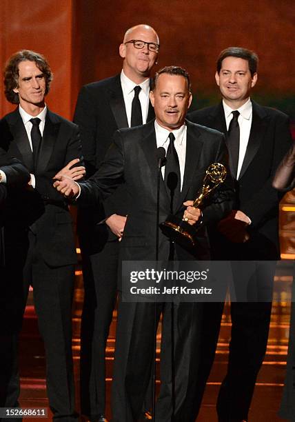 Tom Hanks and fellow producers of 'Game Change' accept their award onstage during the 64th Primetime Emmy Awards at Nokia Theatre L.A. Live on...