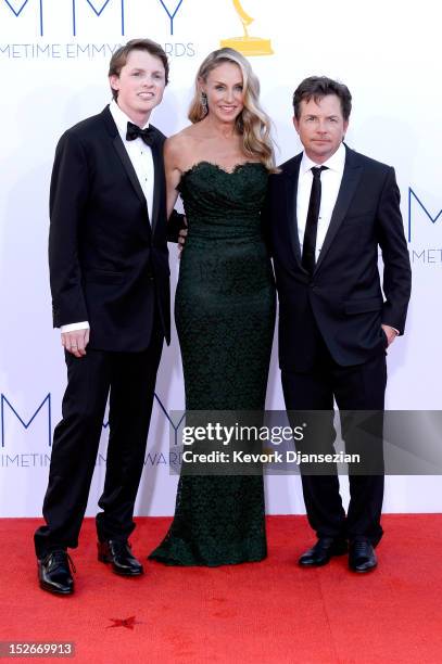 Actor Michael J. Fox , wife Tracy Pollan , and son Sam Fox arrive at the 64th Annual Primetime Emmy Awards at Nokia Theatre L.A. Live on September...