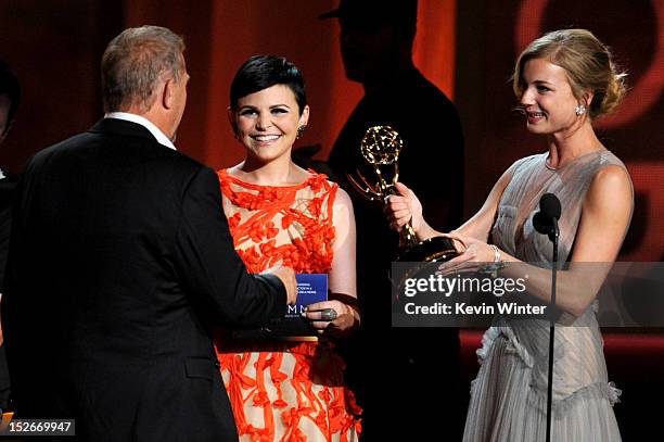 Actresses Ginnifer Goodwin and Emily VanCamp present actor Kevin Costner the Outstanding Lead Actor in a Miniseries or a Movie award for "Hatfields &...