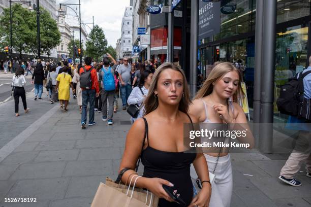 Shoppers and visitors out on Oxford Street on 9th July 2023 in London, United Kingdom. Oxford Street is a major retail centre in the West End of the...