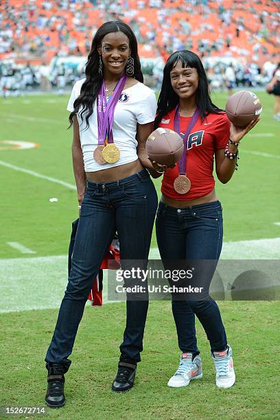 DeeDee Trotter and Kellie Wells attend Miami Dolphins VS NY jets game at Sunlife Stadium on September 23, 2012 in Miami, Florida.