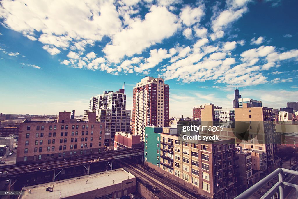 Buildings under cloudy sky