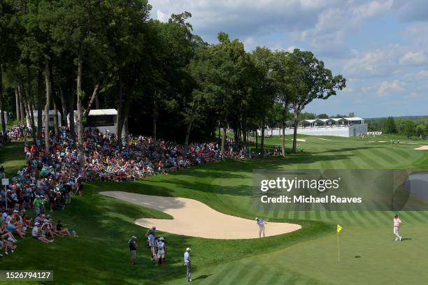Nate Lashley of the United States plays a shot from a bunker on the 18th hole during the third round of the John Deere Classic at TPC Deere Run on...