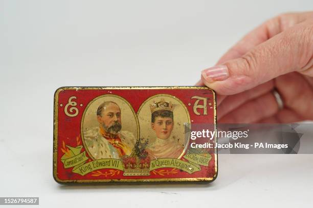 Tin containing Cadbury's chocolates, made to celebrate the coronation of King Edward VII and Queen Alexandra on June 26 before they go up for sale by...