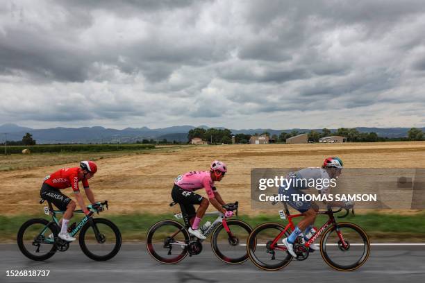 Team Arkea - Samsic's French rider Matis Louvel , EF Education - Easypost's Costa Rican rider Andrey Amador and TotalEnergies' Italian rider Daniel...