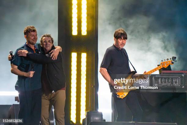 Special guest Phil Daniels performs with Damon Albarn and Alex James of Blur at Wembley Stadium on July 08, 2023 in London, England.