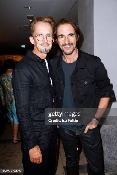 Thorsten Mindermann and Thomas Hayo attend the Vogue X KaDeWe X FCG Summer Night & Fashion Party at KaDeWe on July 11, 2023 in Berlin, Germany.