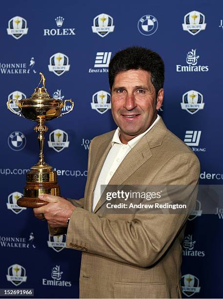 Team Captain Jose Maria Olazabal poses with the Ryder Cup as the Europe team depart for the Ryder Cup from Heathrow Airport on September 24, 2012 in...