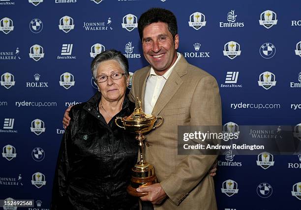 Team Captain Jose Maria Olazabal and his mother Julia pose with the Ryder Cup as the Europe team depart for the Ryder Cup from Heathrow Airport on...