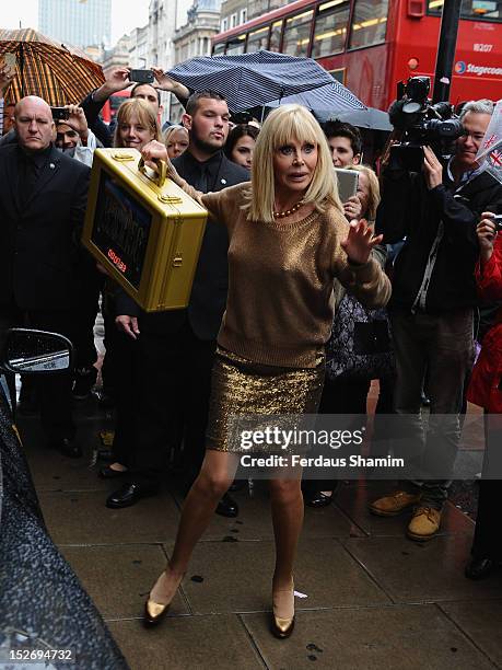 Britt Ekland attends a photocall to announce the Bond 50 Blu-ray collection at HMV, Oxford Street on September 24, 2012 in London, England.