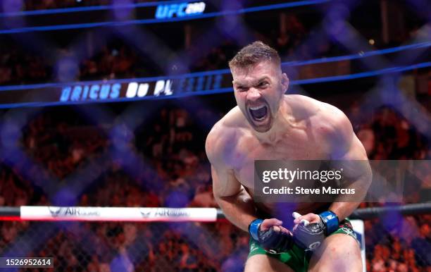 Dricus Du Plessis celebrates after defeating Robert Whittaker in a middleweight bout during UFC 290 at T-Mobile Arena on July 08, 2023 in Las Vegas,...