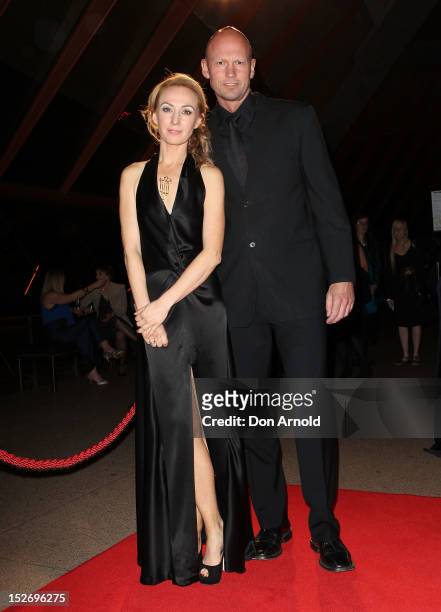 Lisa McCune and Teddy Tahu Rhodes arrive at the 2012 Helpmann Awards at the Sydney Opera House on September 24, 2012 in Sydney, Australia.