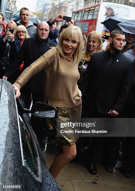 Britt Ekland attends a photocall to announce the Bond 50 Blu-ray collection at HMV, Oxford Street on September 24, 2012 in London, England.