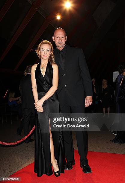 Lisa McCune and Teddy Tahu Rhodes arrive at the 2012 Helpmann Awards at the Sydney Opera House on September 24, 2012 in Sydney, Australia.