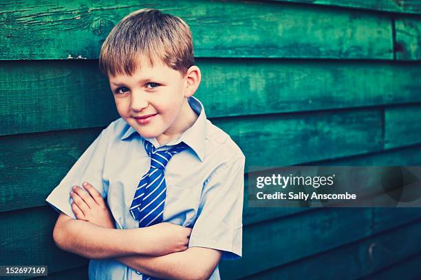 happy smiling school boy - kid leaning stock pictures, royalty-free photos & images