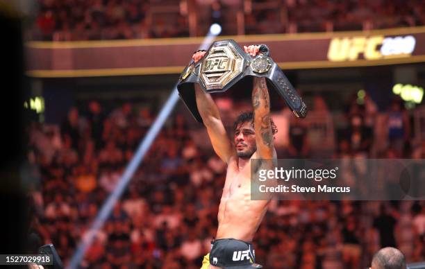 Alexandre Pantoja celebrates after defeating UFC flyweight champion Brandon Moreno during UFC 290 at T-Mobile Arena on July 08, 2023 in Las Vegas,...