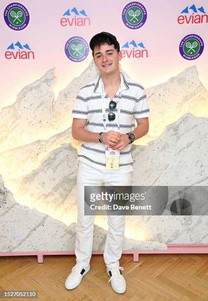 Noah Schnapp poses in the evian VIP Suite At Wimbledon 2023 on July 12, 2023 in London, England.
